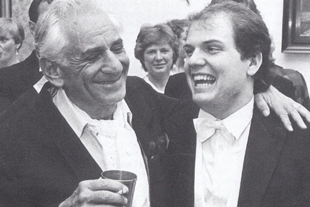 US conductor-composer Leonard Bernstein (left) with Jaap van Zweden, then a young violinist. Van Zweden, music director of the Hong Kong Philharmonic Orchestra, will take up the music directorship of the New York Philharmonic in autumn 2018, the same position that Bernstein took on 60 years ago. Photo: Courtesy of the Hong Kong Philharmonic Orchestra