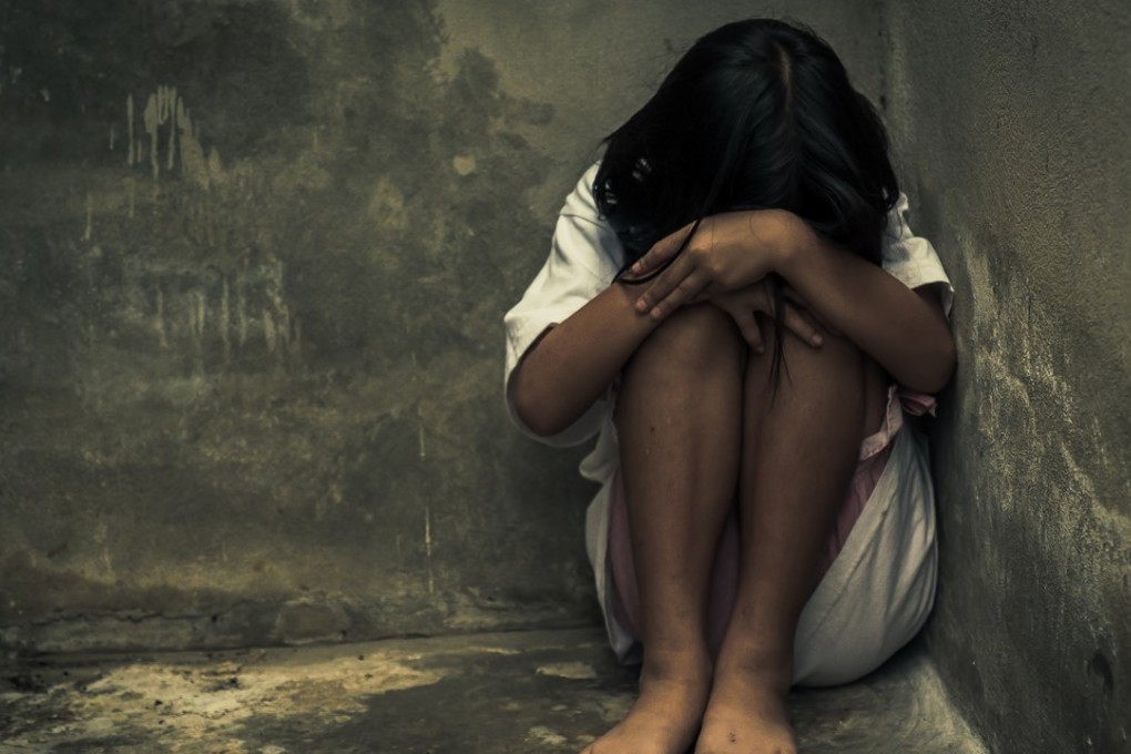 Royalty-free stock photo ID: 667066093 A stock photograph of a frightened girl in a dank room. Photo: Shutterstock