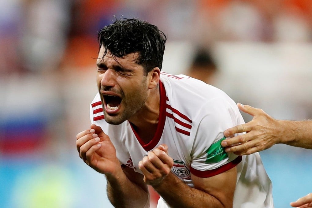 Iran’s Mehdi Taremi reacts after his team’s heartbreaking exit from the World Cup following the draw with Portugal. Photo: Reuters