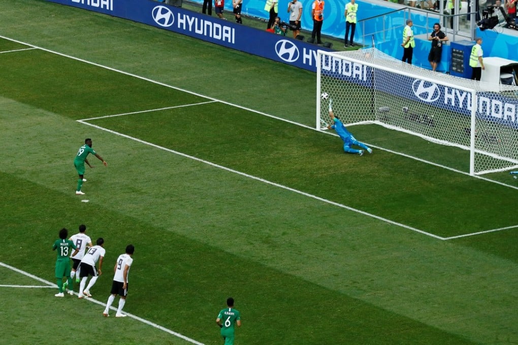Egypt’s Essam El-Hadary saves a spot-kick from Saudi Arabia goalkeeper Fahad Al-Muwallad. Photo: Reuters