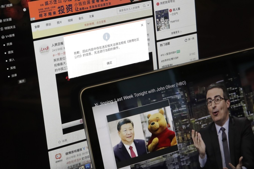 Authorities blocked HBO’s website in China so users just get an error message saying the content violates laws and regulations (rear screen) days after British comedian John Oliver took Chinese President Xi Jinping to task. Photo: AP