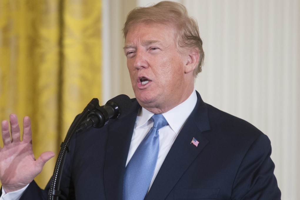 US President Donald Trump hinted on Tuesday that he would restrict deals through a government agency that has already derailed several proposed acquisitions. Photo: EPA-EFE