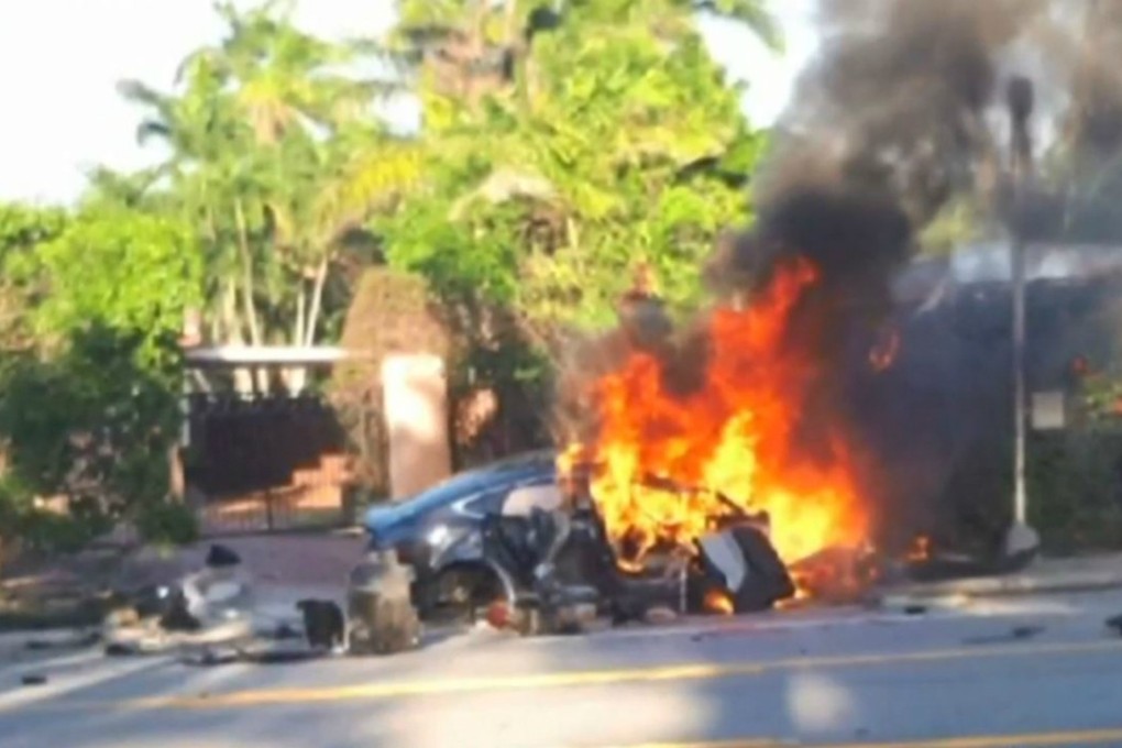 A Tesla Model S is seen shortly after it crashed and exploded, killing two occupants, in Fort Lauderdale, Florida, on May 8. Photo: Via CBS News