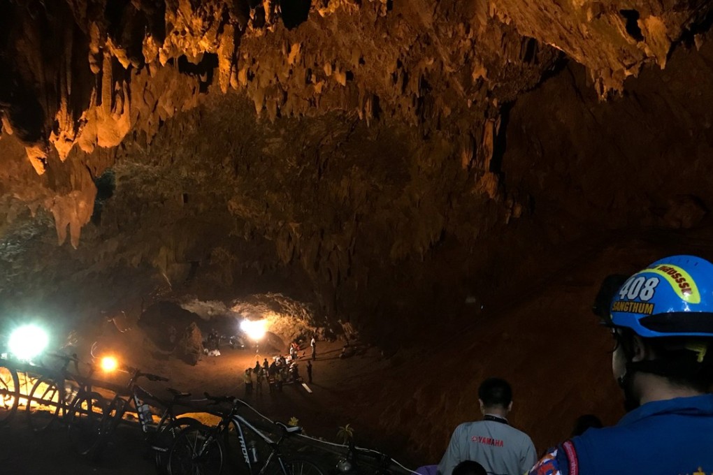 Rescue teams are seen inside of the Tham Luang caves where 13 members of an Under 16 soccer team were trapped in the northern province of Chiang Rai, Thailand on Monday. Photo: Reutrs