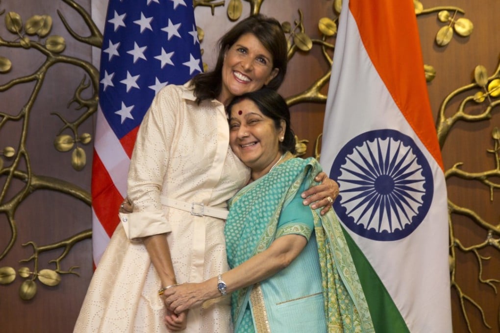 US Ambassador to the United Nations Nikki Haley, left, hugs Indian Foreign Minister Sushma Swaraj before their delegation level meeting in New Delhi. Photo: AP