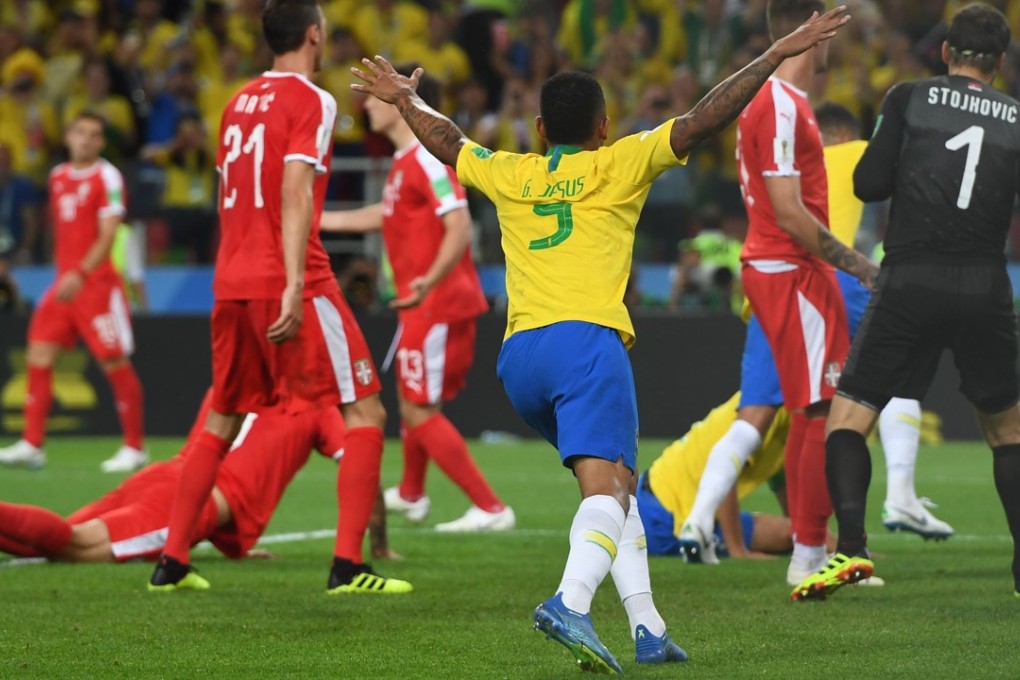 Gabriel Jesus celebrates Thiago Silva’s goal which secured the 2-0 win over Serbia and assured they progressed as group winners. Photo: AFP