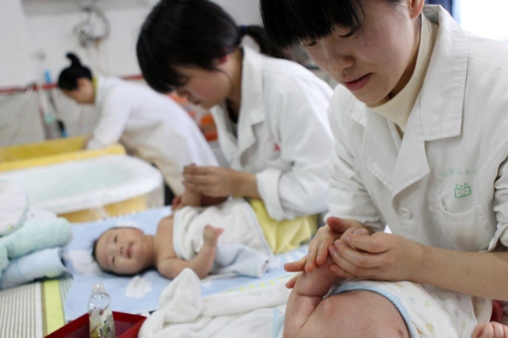 Nurses at an infant care centre in Yongquan, in Chongqing municipality. More babies are needed to help China cope with the effects of an ageing population. Photo: AFP