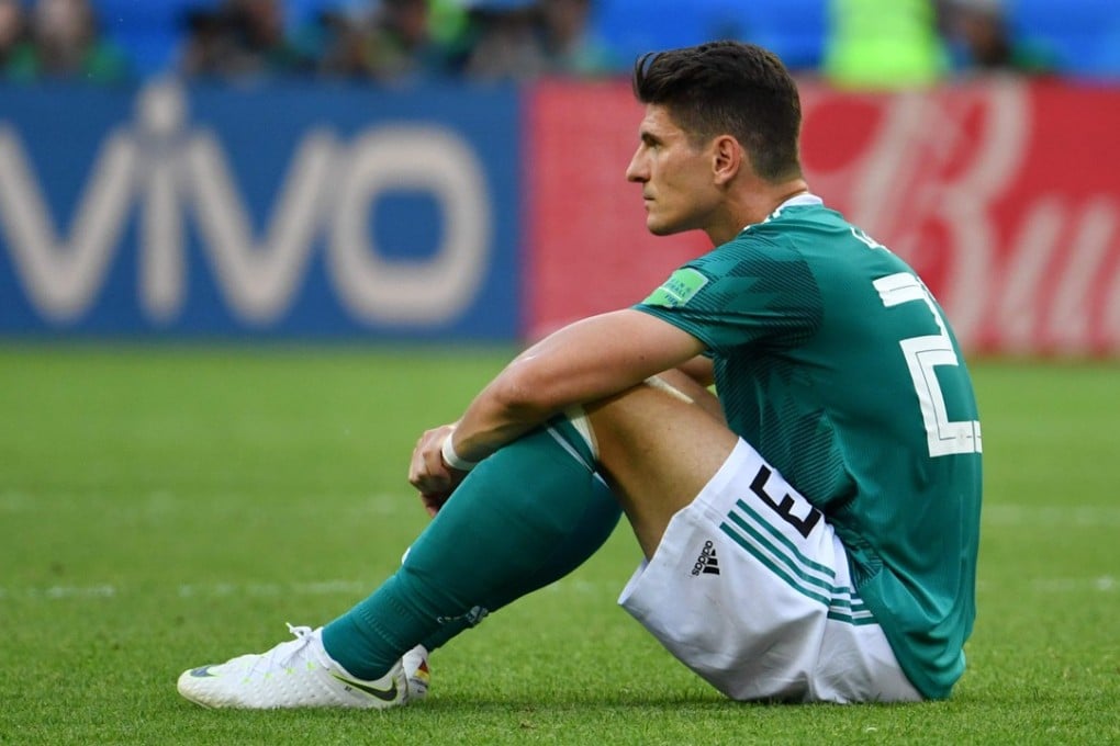 Germany’s Mario Gomez sits dejected at the end of the group F game that saw his country ejected from the 2018 World Cup. Photo: AFP