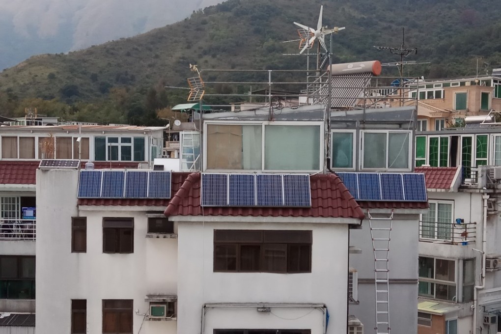 Solar panels on the roof of a village house in Tai Po, in the New Territories of Hong Kong. The attractiveness of the feed-in tariff scheme depends on how soon village house owners can recoup the cost of installing a solar device. The smaller the size of the device, the less electricity it can generate, thus affecting the length of time needed to recoup the installation cost. Photo: Handout