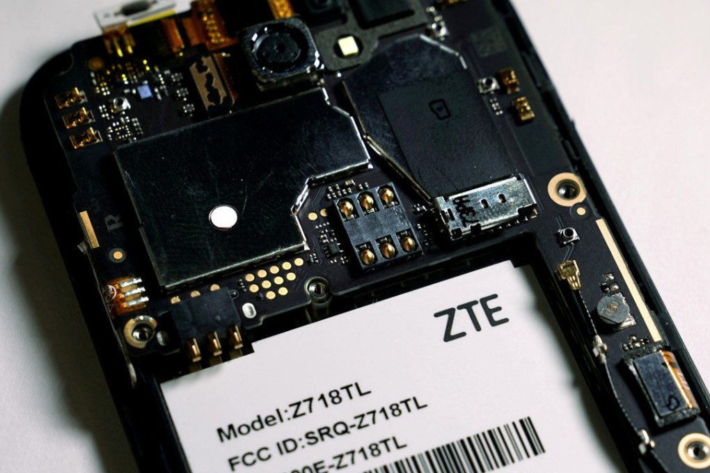 FILE PHOTO: The inside of a ZTE smart phone is pictured in this illustration taken April 17, 2018. REUTERS/Carlo Allegri/Illustration/File Photo