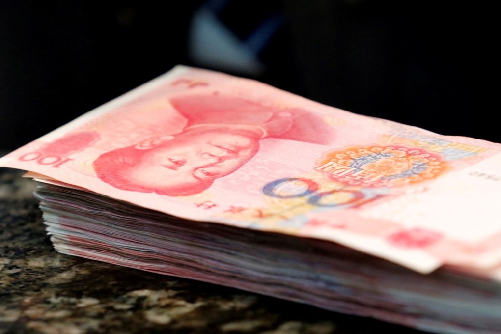 The offshore yuan was trading at 6.6223 against the US dollar on Friday afternoon, while the onshore yuan traded at 6.6144. Photo: Reuters