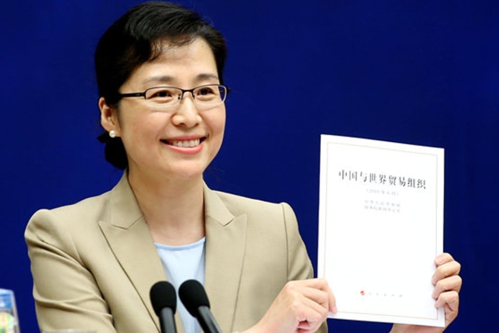 State Council Information Office spokeswoman Xi Yanchun presents the white paper during a press conference in Beijing on Thursday. Photo: Reuters