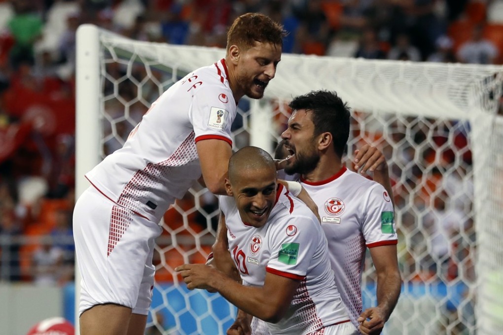 Tunisia’s Wahbi Khazri (centre) celebrates with his teammates after scoring his side’s winning goal against Panama. Photo: AP