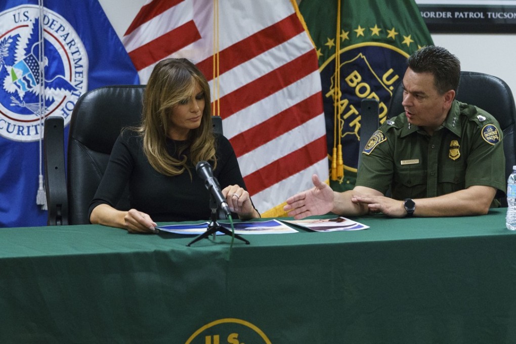 Rodolfo Karisch of the US Border Patrol speaks with first lady Melania Trump on Thursday in Tucson, Arizona. Photo: AP