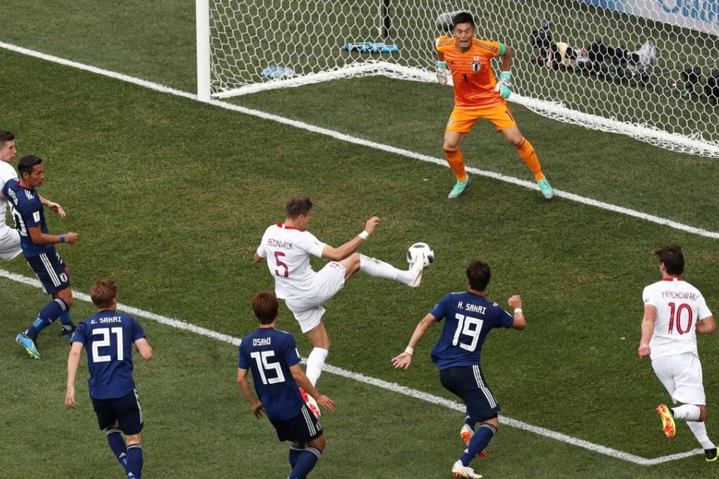 Jan Bednarek prods home the goal for Poland that almost saw Japan eliminated. Photo: Reuters