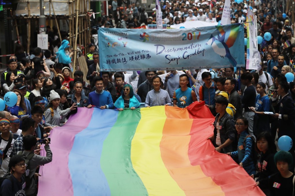 The Hong Kong Pride Parade 2017 passes through Causeway Bay, on November 25. When homosexuality was decriminalised in 1991, the gay community was full of hope about a sexually inclusive future but, 27 years on, the lack of an anti-discrimination law still leaves those of alternative sexual orientations as targets of abuse. Photo: Edward Wong
