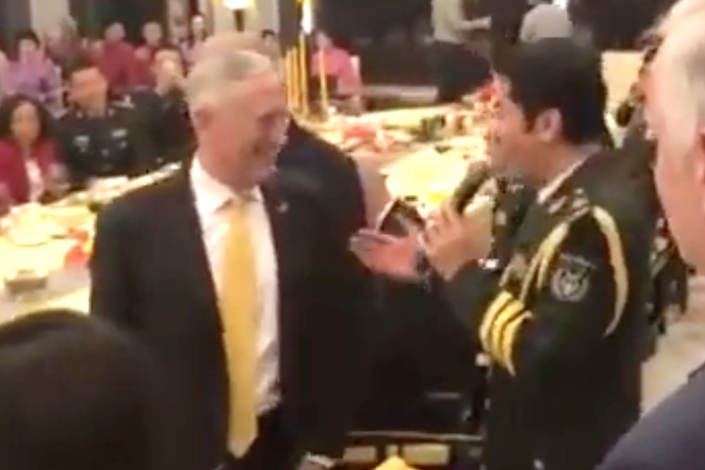 US Secretary of Defence James Mattis talks to Chinese military singer Cai Guoqing during a banquet in Beijing on Wednesday. Photo: Handout