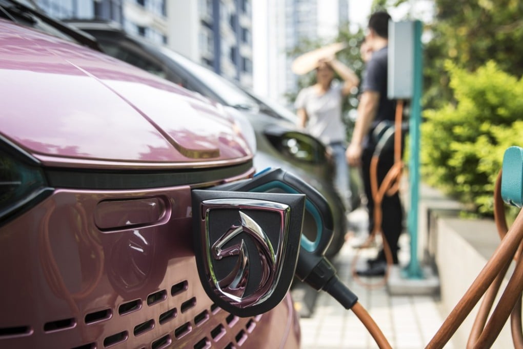 Last year, China sold 777,000 EVs, up 53 per cent from 2016 and is on track to hit the 1 million mark in 2018. (Above) a Baojun E100 electric vehicle stands plugged in to a charging station outside a SAIC-GM-Wuling Automobile customer experience centre, in Liuzhou, Guangxi province. Photo: Bloomberg