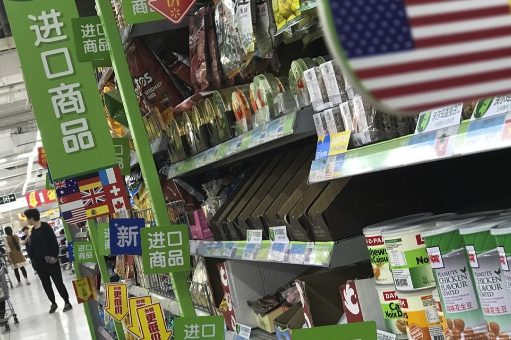 Items imported from the US and other countries on display in a supermarket in Beijing. A report released by China’s State Council Information Office last week outlining its commitment to the WTO should provide some reassurance to frustrated foreign companies based on the mainland. Photo: AP