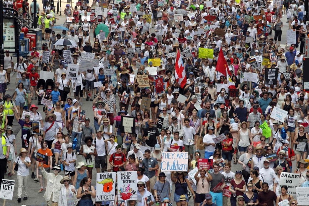 Protesters march through the streets of Chicago during a demonstration against immigration policy on Saturday. Photo: AFP