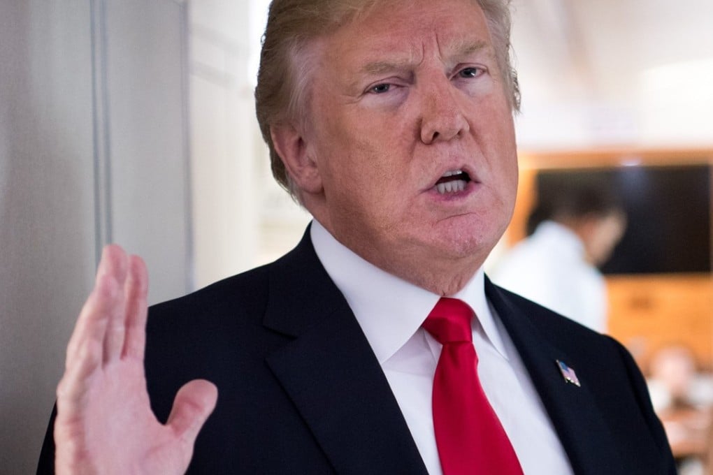 (FILES) In this file photo taken on June 29, 2018 US President Donald Trump speaks to the press aboard Air Force One in flight as he travels from Joint Base Andrews in Maryland, to Bedminster, New Jersey. North Korea is "very serious" about efforts toward denuclearization, US President Donald Trump said in remarks broadcast on July 1, 2018."I think they're very serious about it. I think they want to do it," he said in a prerecorded interview on Fox News' "Sunday Morning Futures" program. "We have a very good chemistry," he said. / AFP PHOTO / SAUL LOEB