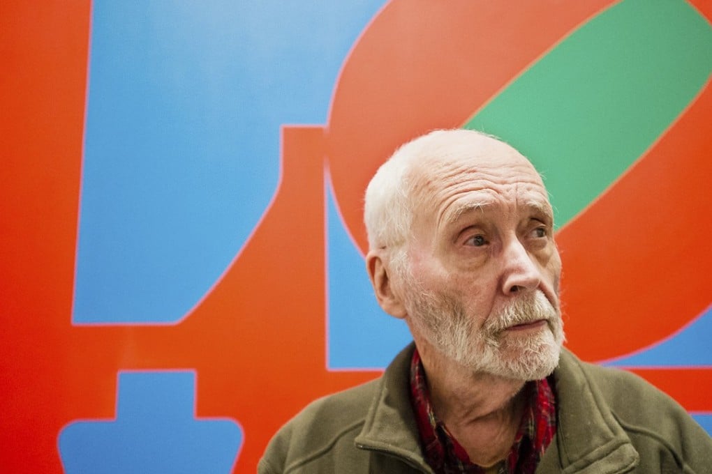 US artist Robert Indiana, pictured here in front of one of his paintings at New York’s Whitney Museum of American Art, is known the world over for his Love images. Photo: AP