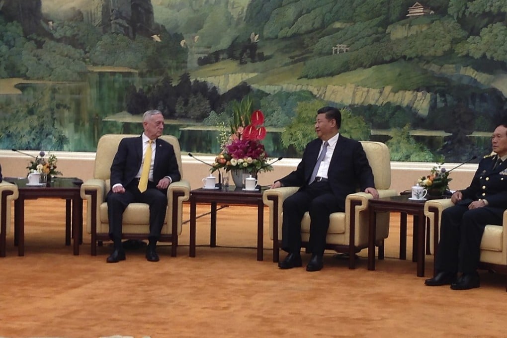 US Defense Secretary Jim Mattis, second from left, talks to Chinese President Xi Jinping during their meeting at the Great Hall of the People in Beijing on Thursday. Photo AP