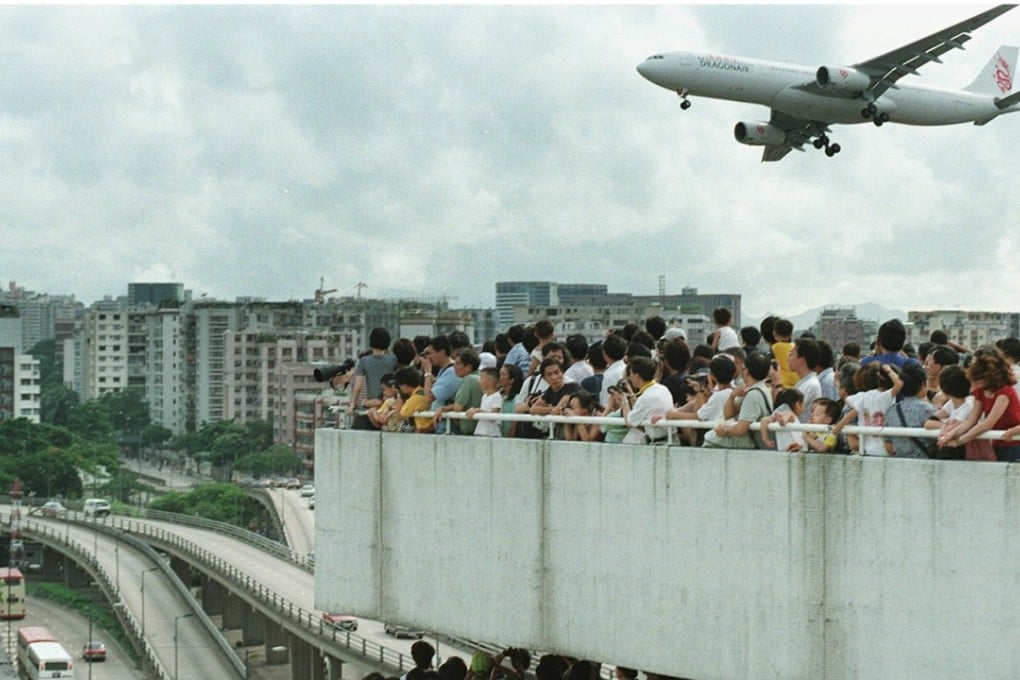 People throng the terrace of a car park near Kai Tak in June 1998. Picture: SCMP