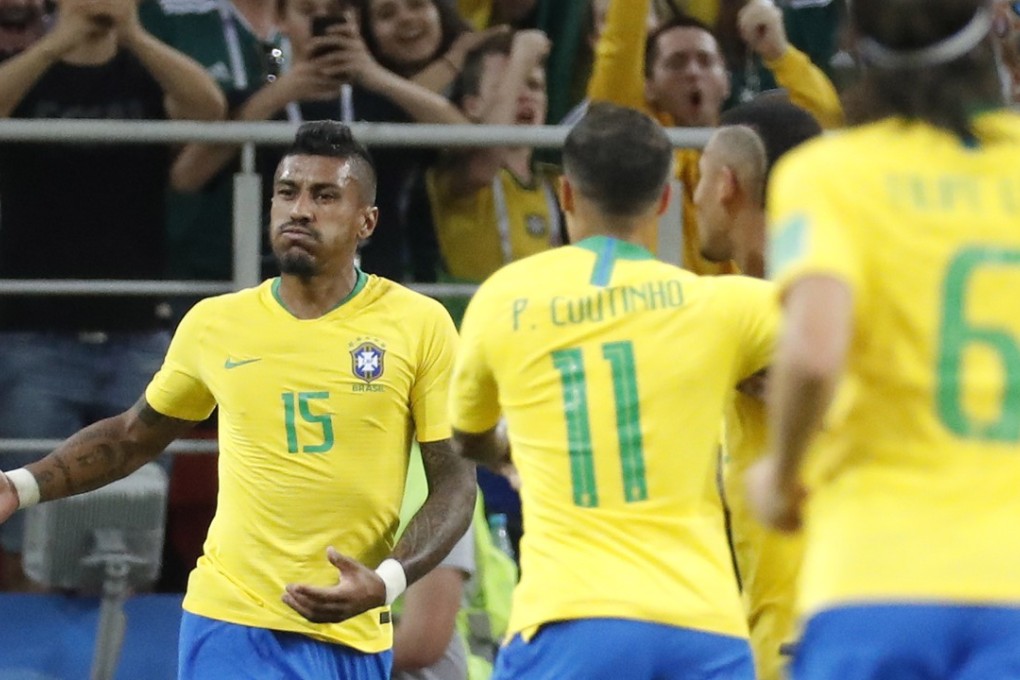 Brazil’s Paulinho (15) celebrates after scoring a goal against Serbia. Photo: EPA