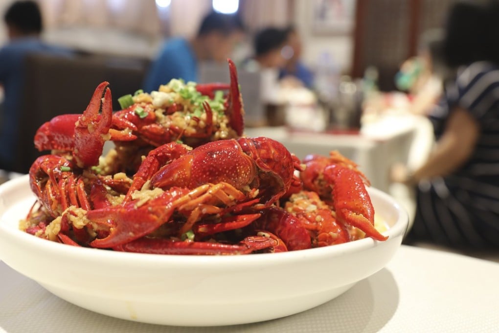 Eating crayfish is a favourite pastime in China, especially while watching the World Cup . Photo: Simon Song