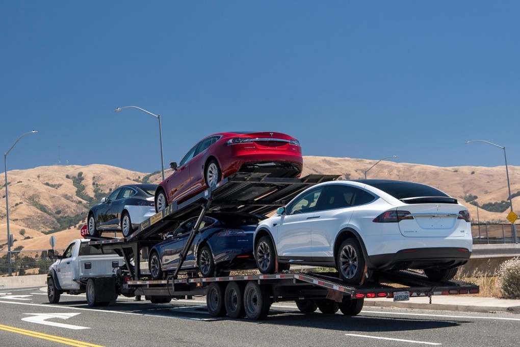 Tesla Inc. vehicles are transported on a truck after leaving the company's manufacturing facility in Fremont, California, on June 20. Photo: Bloomberg