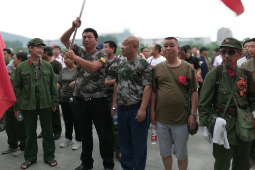 Thousands of military veterans took to the streets of Zhenjiang, Jiangsu last month seeking better welfare rights and an end to violence against them. Photo: Handout