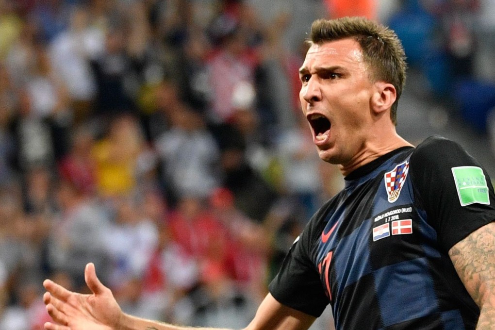 Jorgensen scores fastest ever goal for Danes before Mandzukic equalises as teams battle for quarter-final against Russia