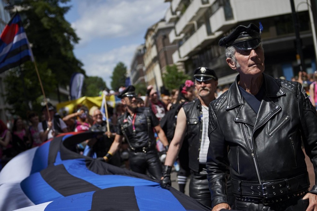 Members of Britain’s LGBT community take part in the annual Pride Parade in London. The government is moving to ban gay conversion therapy amid a wider action plan on discrimination. Photo: AFP
