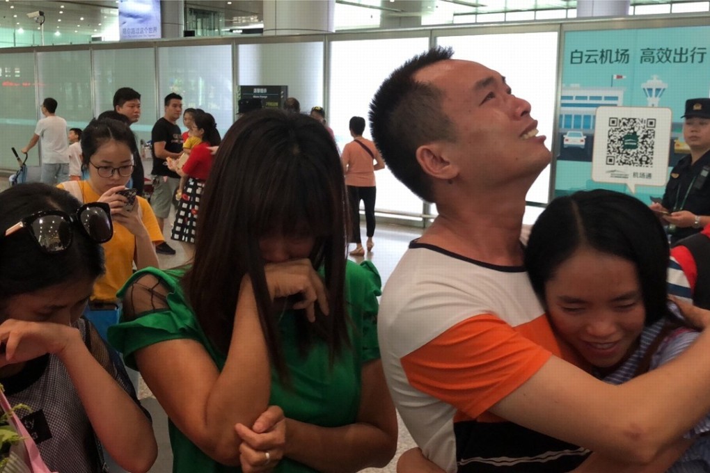 Chinese-American Kylee Bowers (right) is reunited with her biological family in Guangzhou on Sunday. Photo: Weibo