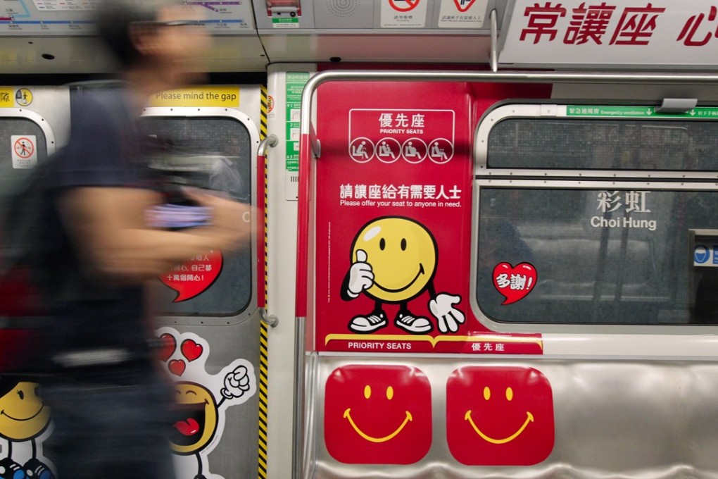 Commuters on Hong Kong’s MTR often fail to give up priority seats to those who need them. Photo: K.Y. Cheng