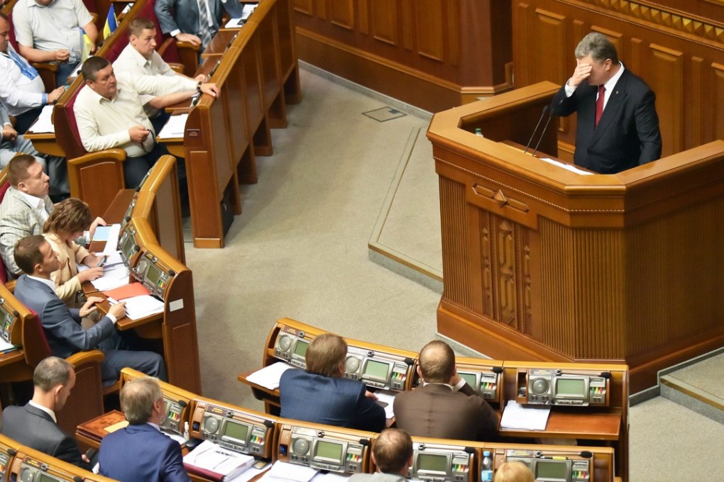 Ukraine’s President Petro Poroshenko said new legislation would improve military-technical cooperation between Ukraine and Nato . Photo: AFP