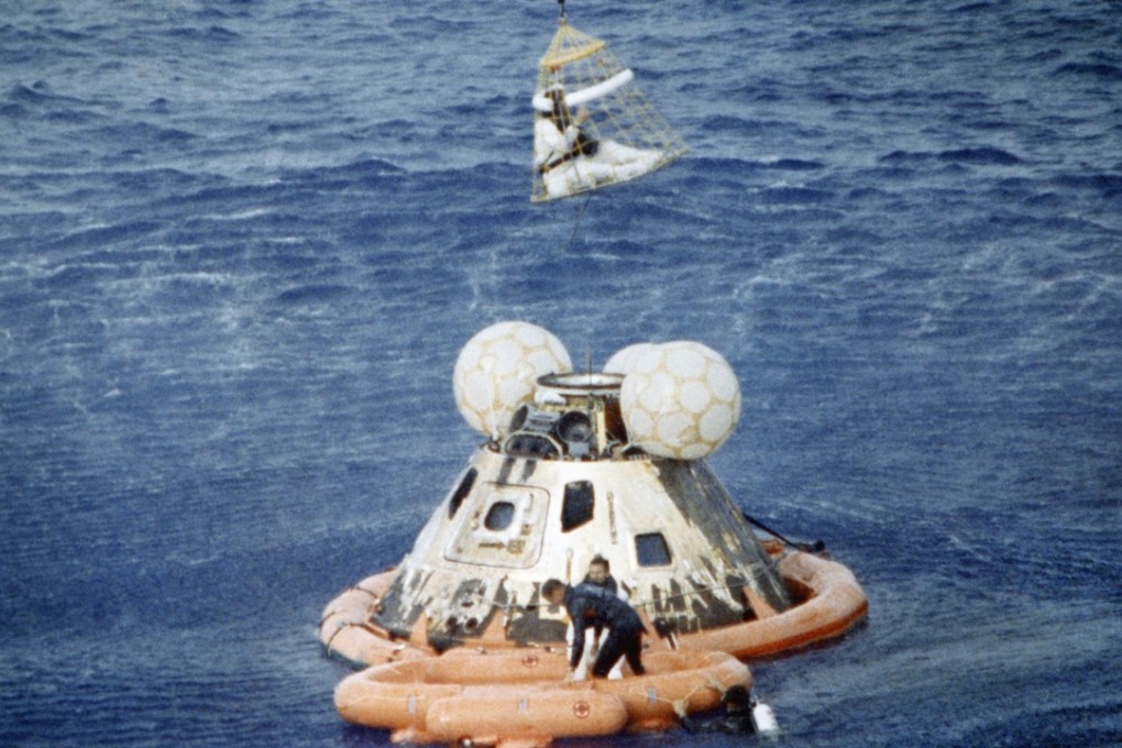 Astronauts are lifted to safety from the Apollo 13 spacecraft after splashdown in the South Pacific. Photo: Alamy