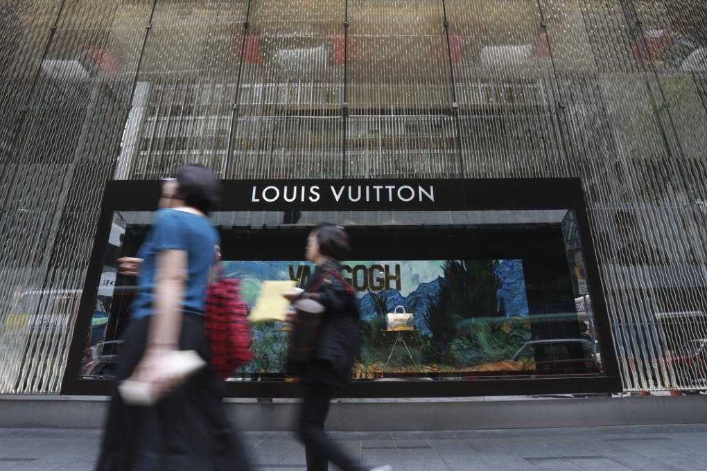 This photograph shows the exterior of Louis Vuitton shop in Central, Hong Kong. 07JUL17 SCMP / May Tse