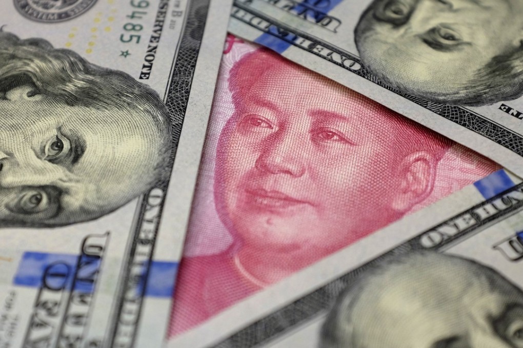 US$100 banknotes and a Chinese 100 yuan banknote. Photo illustration: Reuters