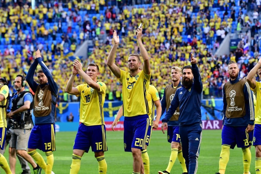Sweden's players celebrate their victory over Switzerland. Photo: AFP