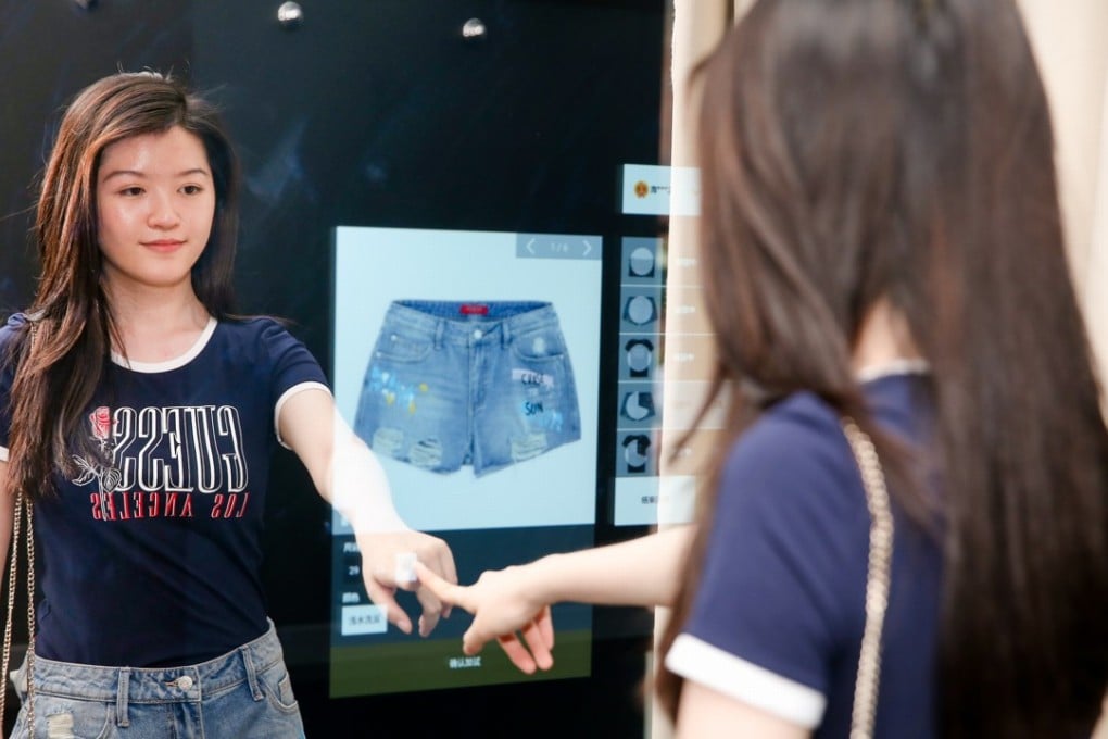 Lifetsyle brand Guess’ FashionAI concept store uses smart mirrors to display items that customers select. The smart mirror can also provide mix and match suggestions and product details of items in the store. Photo: Handout