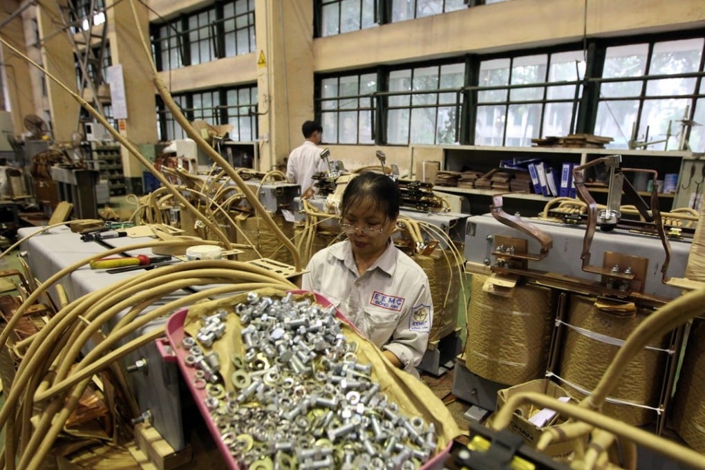 Trade tensions have accelerated the movement of investment into Vietnam, which is home to Dong Anh Electrical Equipment’s transformer making workshop in Hanoi. Photo: EPA