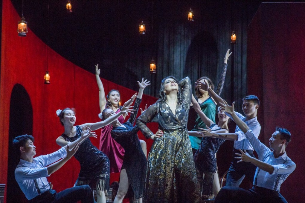 Armenian singer Varduhi Abrahamyan (centre) plays the lead role in an Opera Hong Kong production of Bizet’s Carmen. Bringing international stars to Hong Kong allows the company to enhance the skills of local singers.