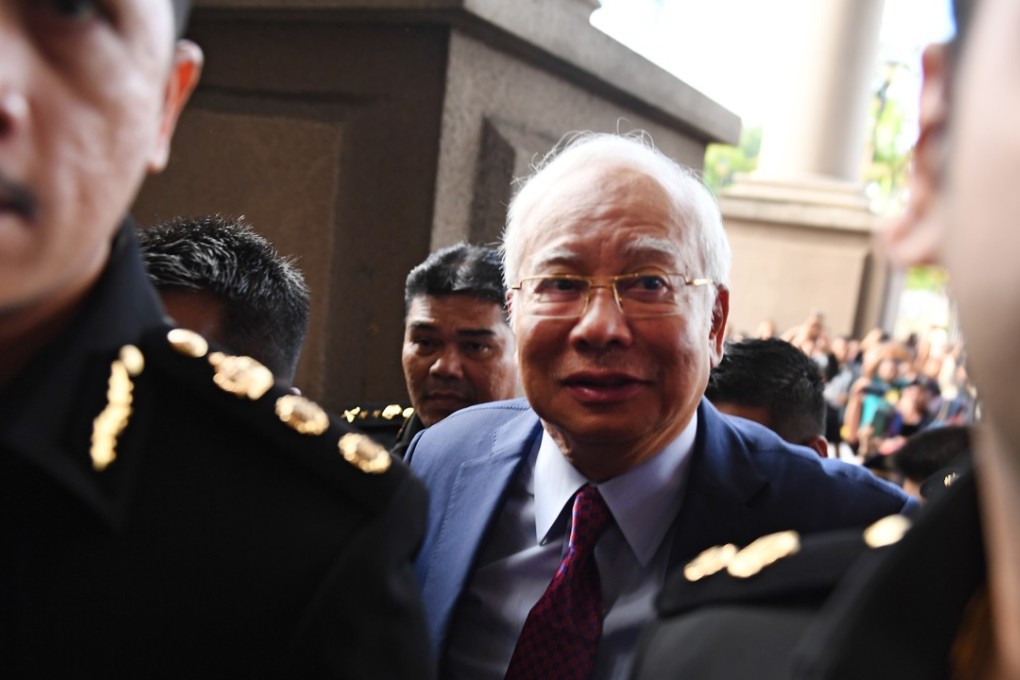 Former Malaysian prime minister Najib Razak arrives at the Duta court complex in Kuala Lumpur. Photo: AFP