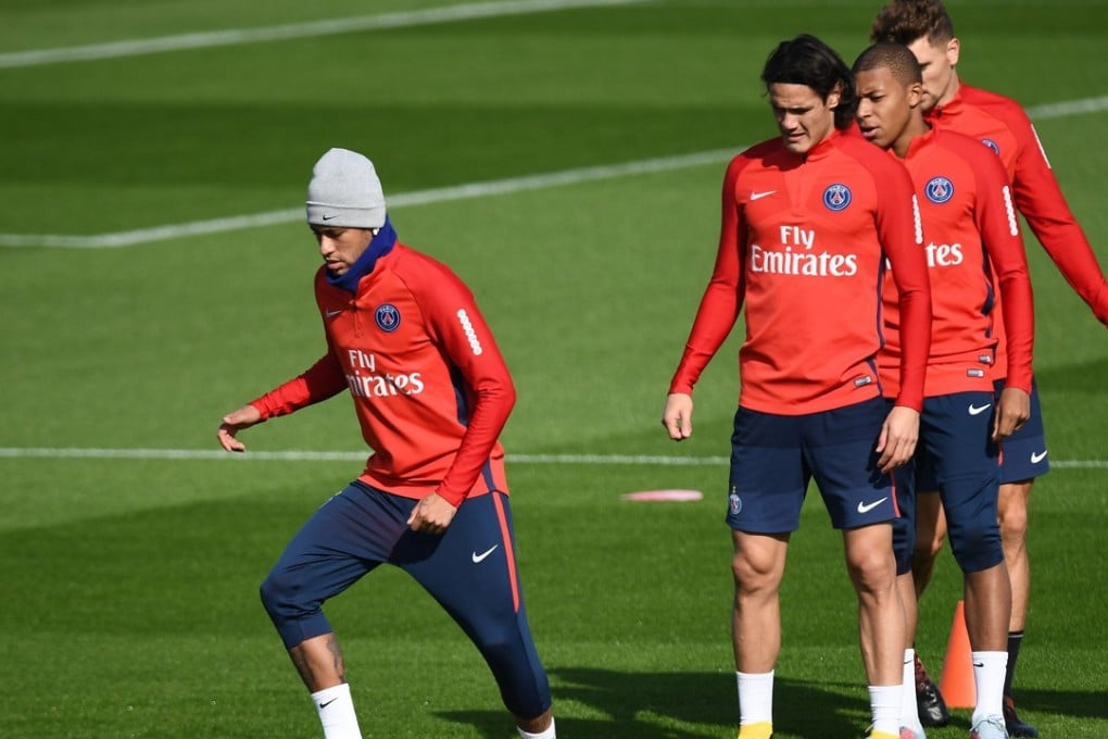 Paris Saint-Germain's Brazilian forward Neymar controls the ball next to Uruguayan forward Edinson Cavani and French forward Kylian Mbappe. Photo: AFP