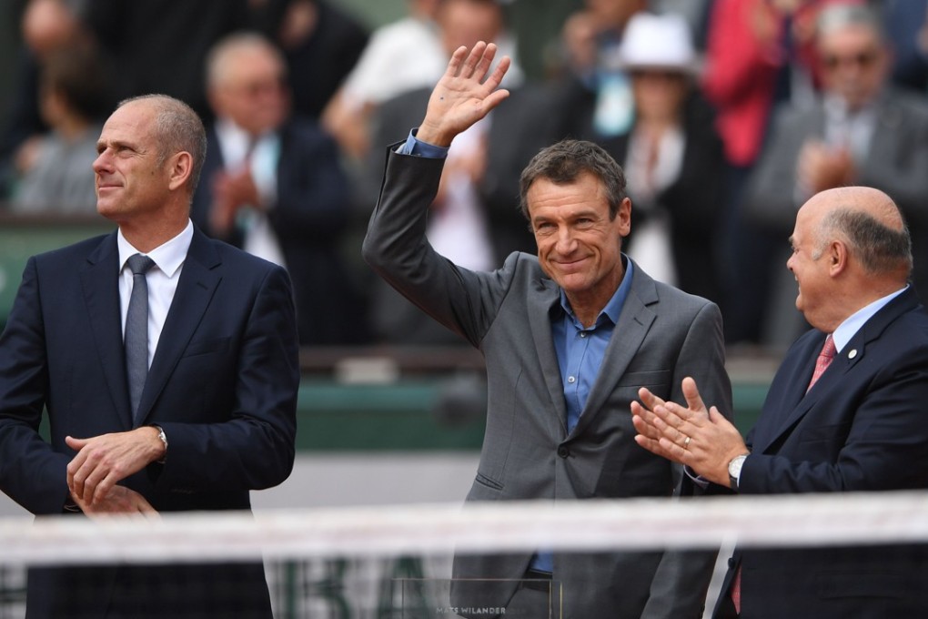 Former Swedish tennis player Mats Wilander (centre) is suggesting the Wimbledon authorities should consider changing its schedule. Photo: AFP
