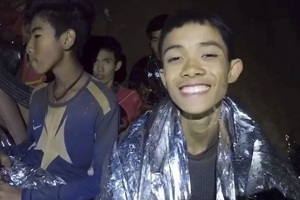 Trapped young footballers are seen in the cave in Chiang Rai, Thailand. All are in relatively good health. Photo: Xinhua