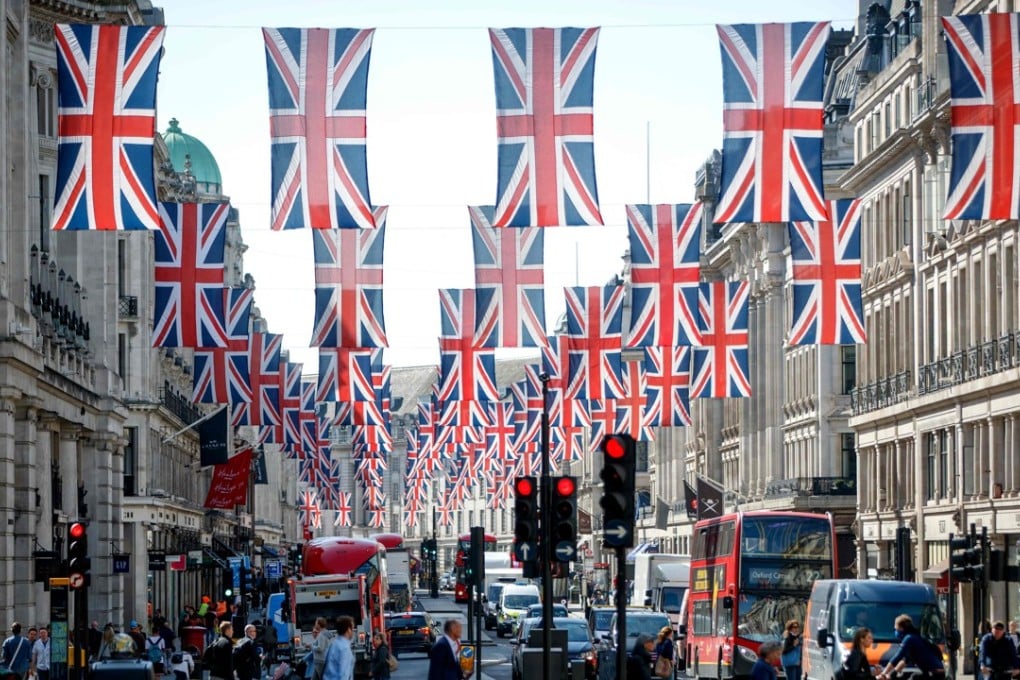 Union flags line London’s Regent Street on May 11, a week before the wedding of Prince Harry with American actress Meghan Markle. Photo: AFP