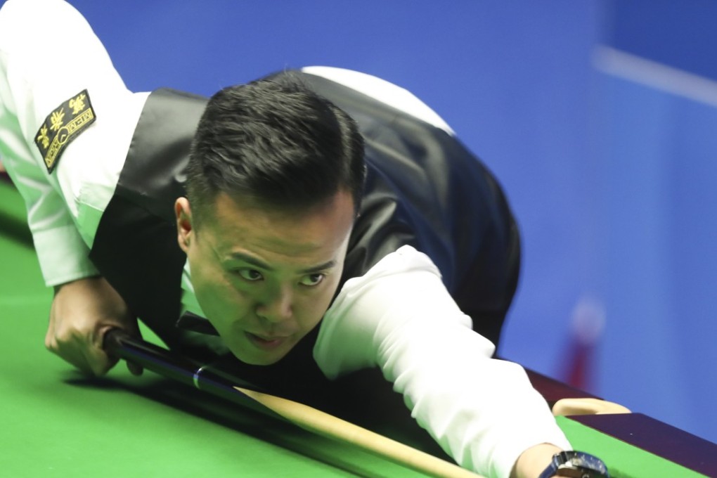 Marco Fu Ka-chun of Hong Kong of China competes during the first round match with Lyu Haotian of China at the World Snooker Championship 2018 at the Crucible Theatre in Sheffield. Photo: Xinhua